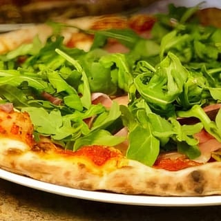 Personal Prosciutto and Arugula Pizza
